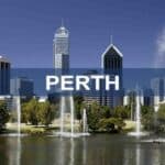 Iconic Perth city skyline featuring modern skyscrapers and the vibrant Fountain Park in the foreground, showcasing Perth's urban landscape and natural beauty.